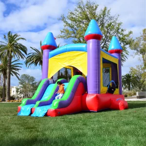 jelly bean castle bounce house dual lane slide and basketball hoop and basketball